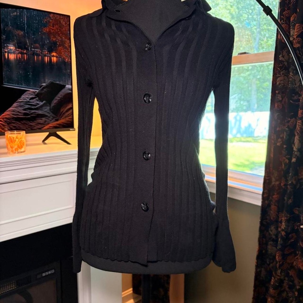 Black button up sweater with flared sleeve detail